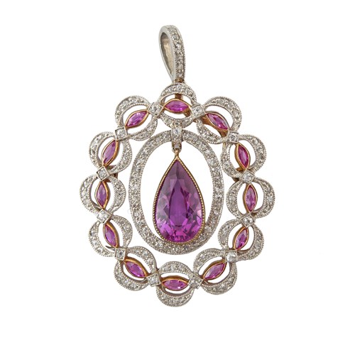 Early 20th century pink sapphire and diamond garland pendant, English c.1905, of oval outline hung to centre with a pear shaped pink sapphire of approximately 2.25ct,